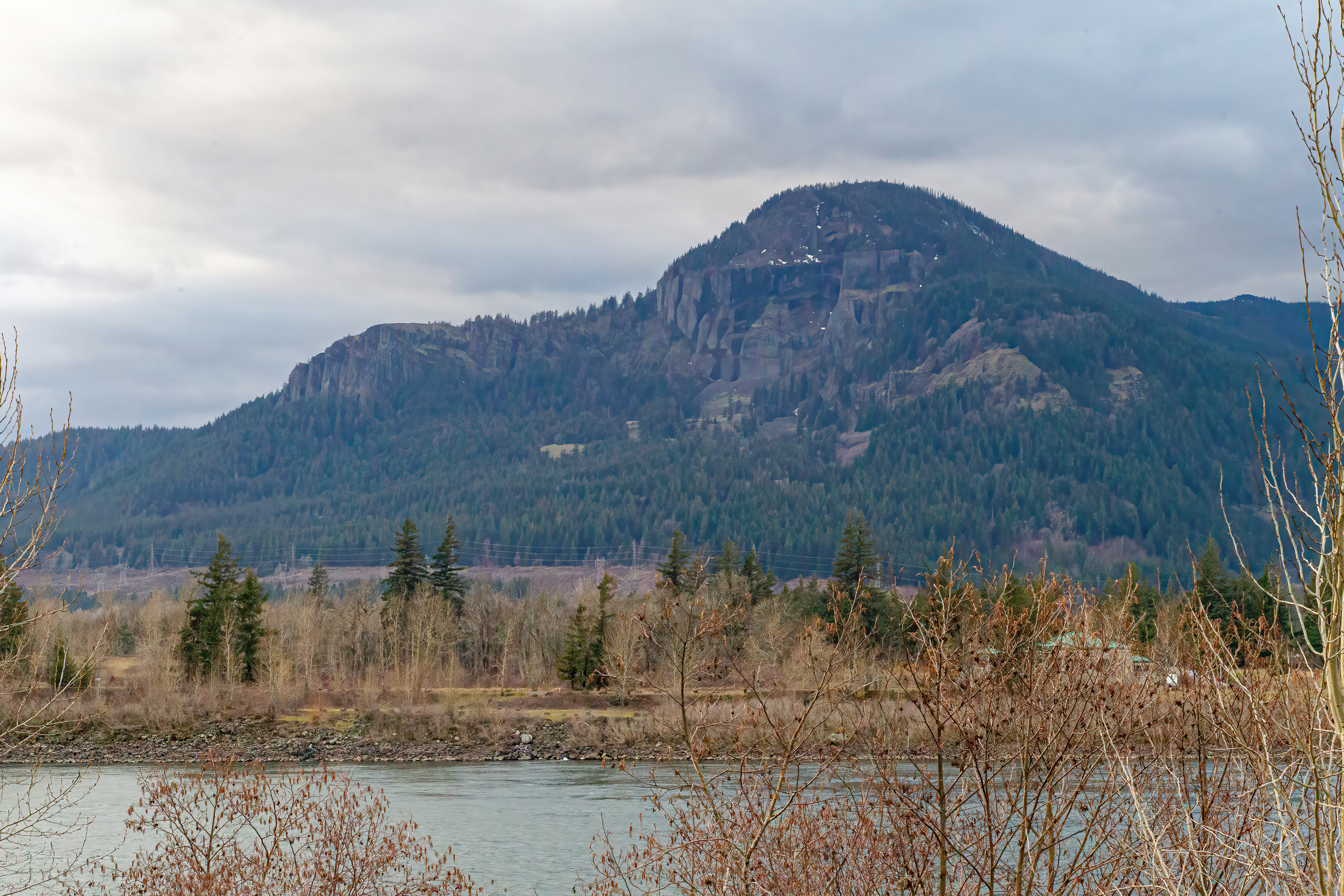 A lone mountain peak on the Washington side of the Columbia River.